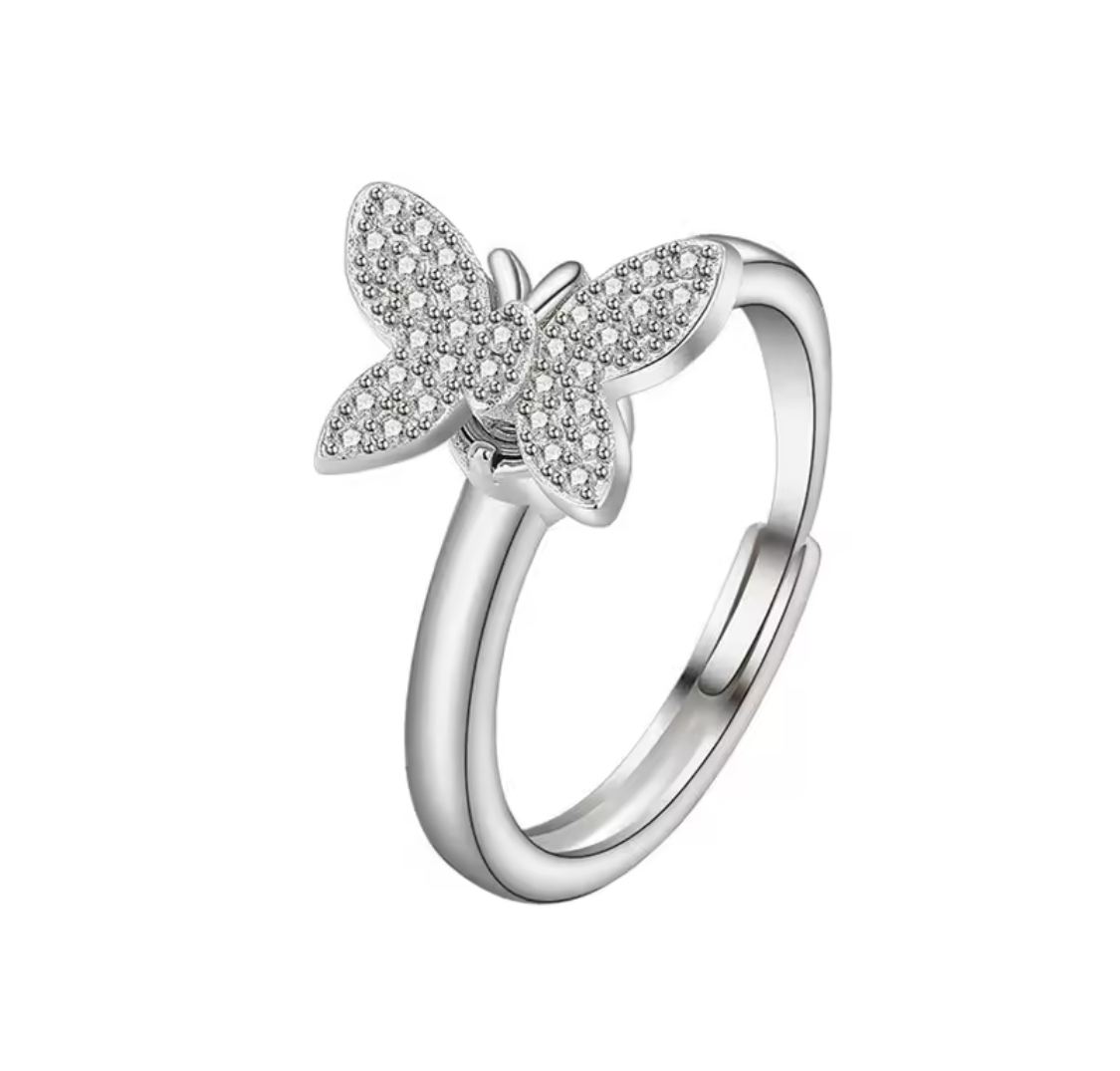 Anillo antiestrés con mariposa de cristal plateado