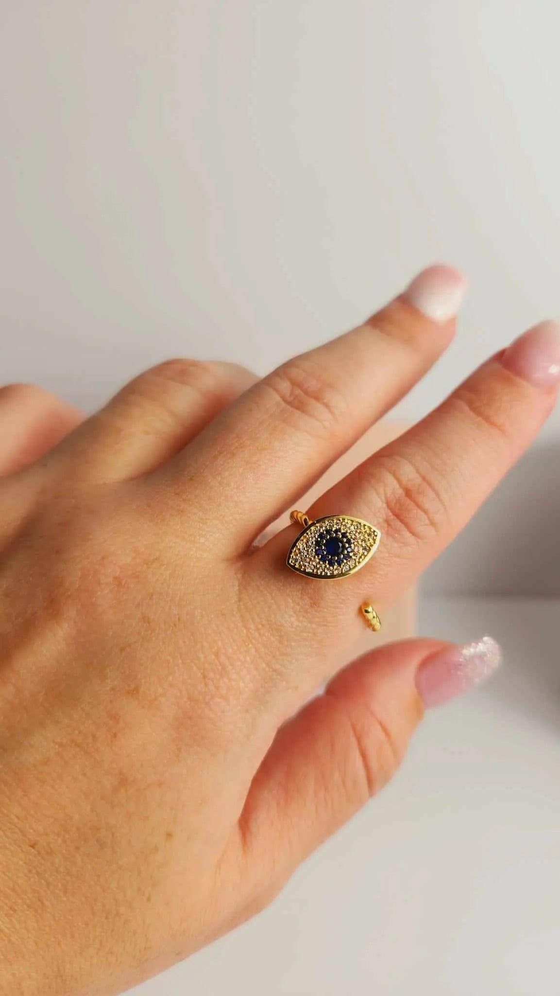 Anillo Fidget Spinner chapado en oro con forma de ojo malvado