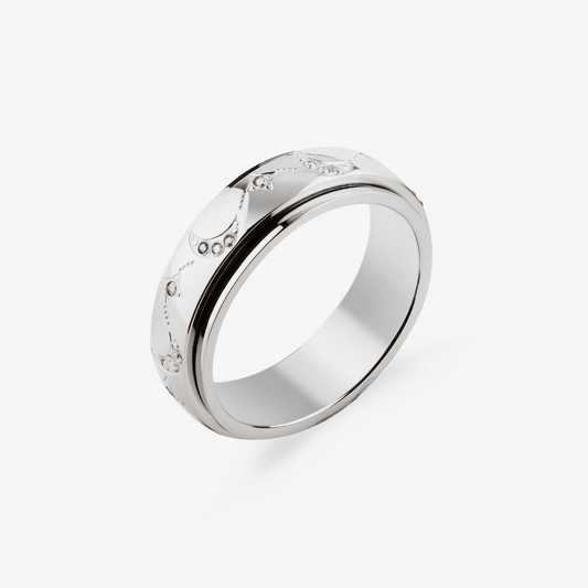 Silver moon and star pattern anxiety ring