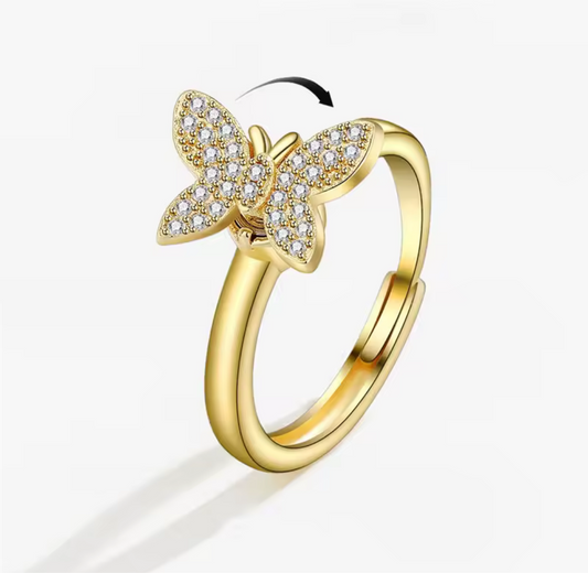 Anillo antiestrés con mariposa de cristal dorado
