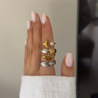 Silver moon and star pattern anxiety ring