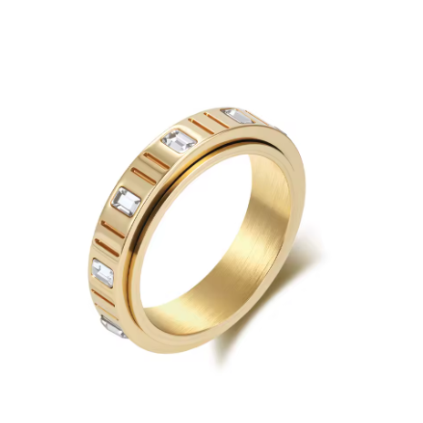 Anillo de ansiedad de cristal blanco y dorado