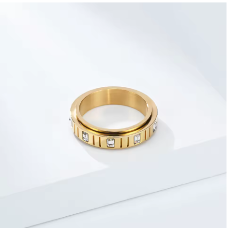 Anillo de ansiedad de cristal blanco y dorado