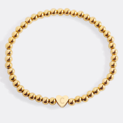 Gold Beaded Bracelet with Heart Initial