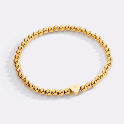 Gold Beaded Bracelet with Heart Initial