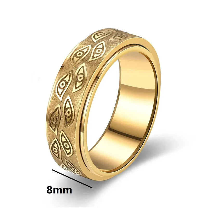 Anillos giratorios vintage con ojos tallados