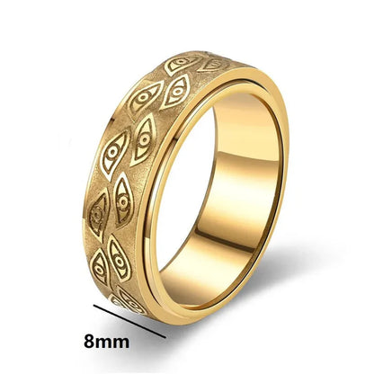 Anillos giratorios vintage con ojos tallados