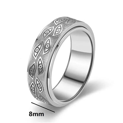 Anillos giratorios vintage con ojos tallados