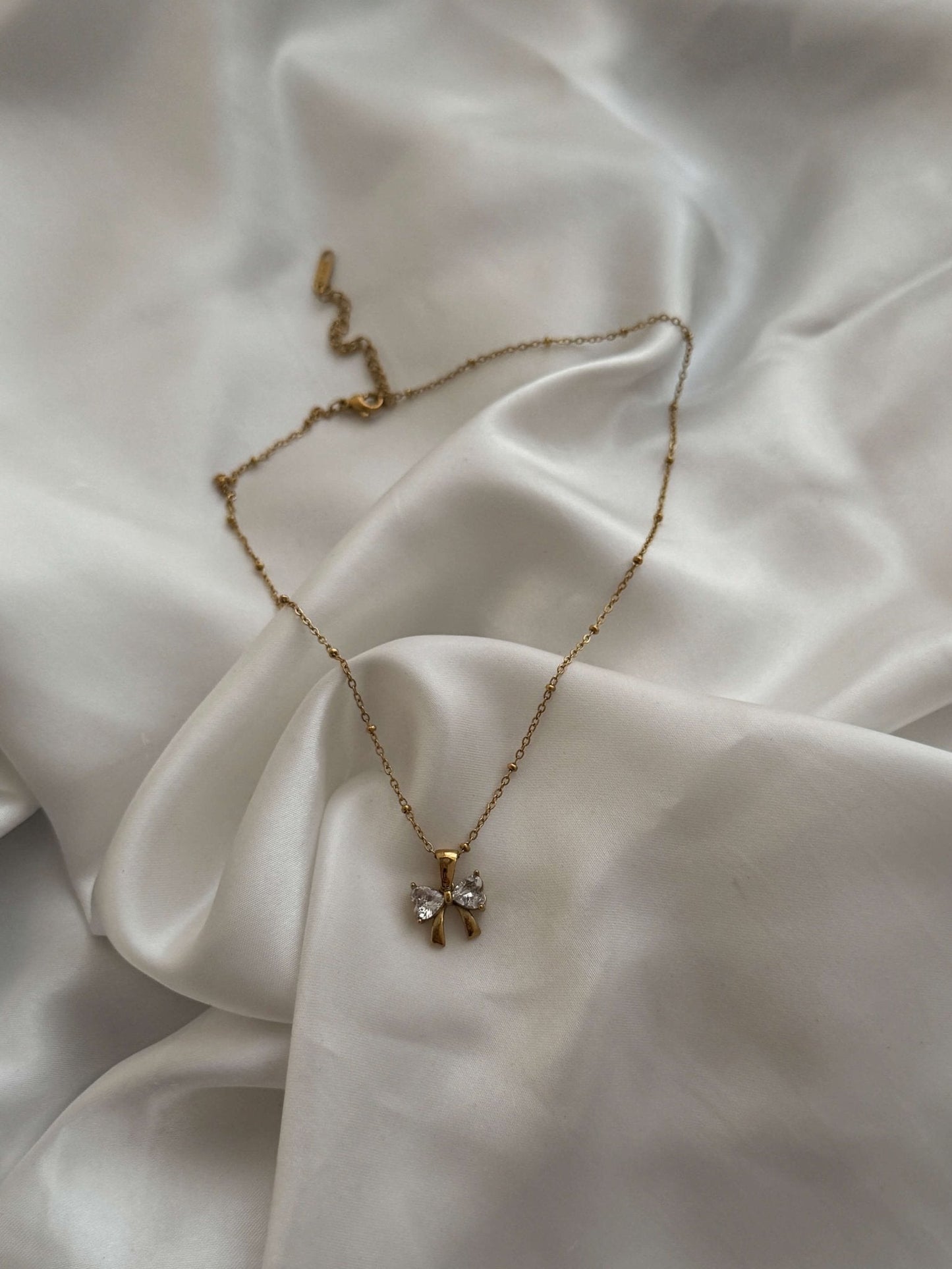 Amara Zirconia Bow Pendant Necklace