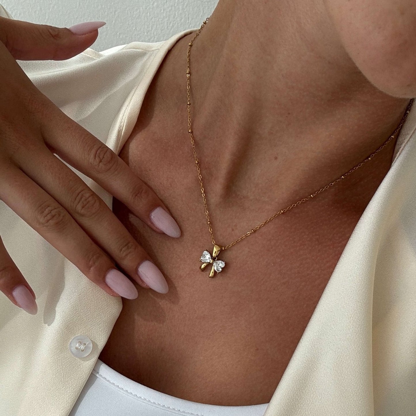 Amara Zirconia Bow Pendant Necklace